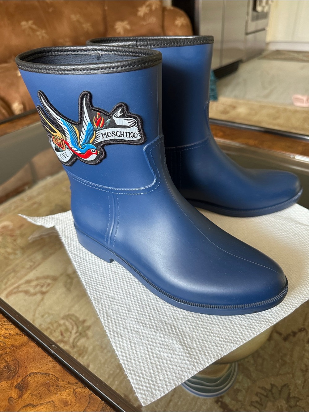 Moschino Blue Rubber Rain Boots with Decorative Bird Patch, size 38.